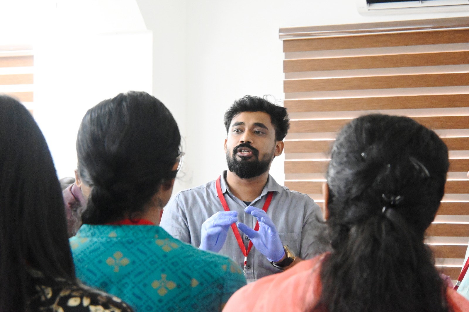 Participants practising hands-on emergency care skills